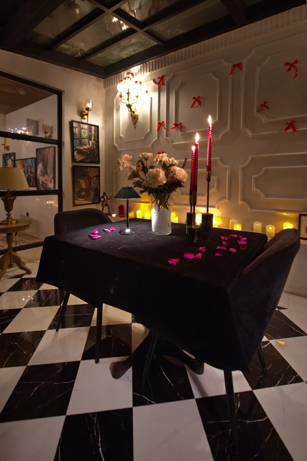 A candlelit table set for two